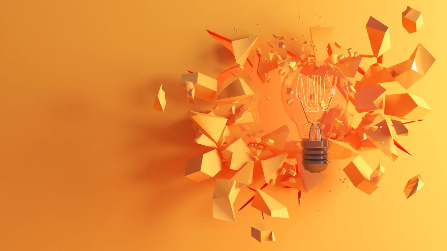 Exploding orange lightbulb illustrating fresh thinking about how AI is proving the value of subject matter experts in localization